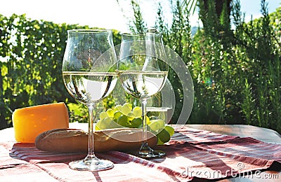 Pair of wineglasses and bunch of grapes Stock Photo