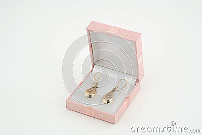 Pair of yellow gold earrings in a box Stock Photo