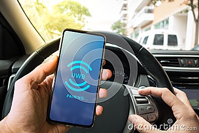 Pairing Smartphone with Car system through UWB radio technology Editorial Stock Photo