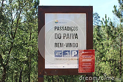 Paiva, Portugal - August 2018: Welcome sign for famous Paiva Walkway in Portugal, with Conditioned Circulation warning Editorial Stock Photo