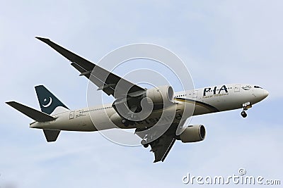 Pakistan International Airlines Boeing 777 in New York sky before landing at JFK Airport Editorial Stock Photo