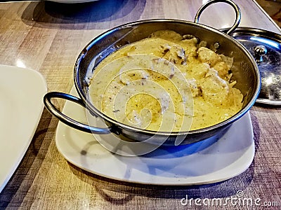 Pakistani chicken white karahi in sauce pan Stock Photo