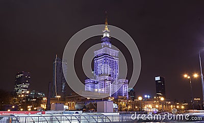 Palace of Culture and Science in the city center of Warsaw at night, Poland. Editorial Stock Photo