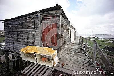 palafitico pier built in a disorganized and rustic way. recycled building materials Stock Photo