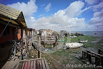 palafitico pier built in a disorganized and rustic way. recycled building materials forming a popularly designated area for tents Stock Photo