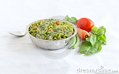 Palak or Spinach Rice Pilaf in a Steel Bowl Stock Photo