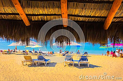 Palapa Straw hut umbrella on Tropical Beach Editorial Stock Photo