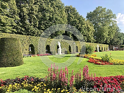 Palastgarten, the Palace Gardens in Trier, an elegant french style palace with garden, fountains and sculptures Editorial Stock Photo