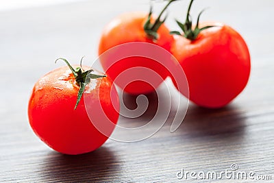 Palatable fresh tomatoes Stock Photo