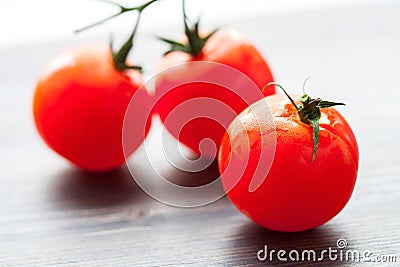 Palatable fresh tomatos Stock Photo