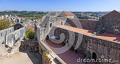 The Palatial Residence (Pacos Novos) on the right, and the ruins of the Nossa Senhora da Pena church on the left Stock Photo