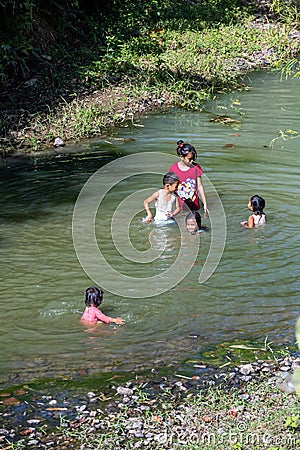 Filipino Children in a river Editorial Stock Photo