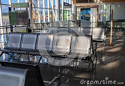 Palawan, Philippines - 30 Nov 2018 - Empty airport interior with chairs. Travel ban in airport concept Editorial Stock Photo