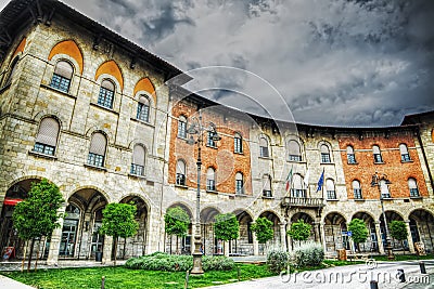 Palazzo della Provincia under a cloudy sky in Pisa Stock Photo