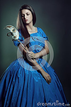 Pale aristocratic woman with venetian mask Stock Photo