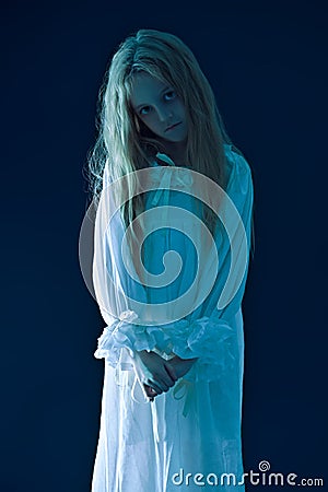 Pale girl ghost in nightgown Stock Photo