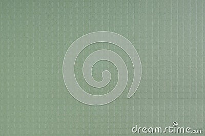 Pale green textured background with square grid embossed Stock Photo