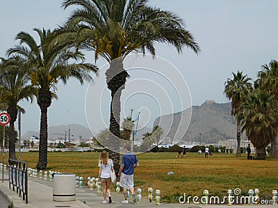 Palermo, Sicily, Italy. may 11, 2017. A couple walking in a park in palermo Editorial Stock Photo