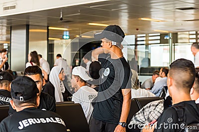 Palestine young boys waiting on board at the terminal in Istanbul Sabiha Gokcen International Airport in the early morning Editorial Stock Photo