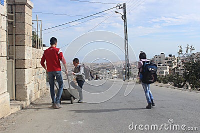 Palestinian boys walking home from school, Palestine Editorial Stock Photo