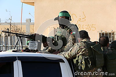 Palestinian fighters take part during a military drill carried by armed groups Editorial Stock Photo