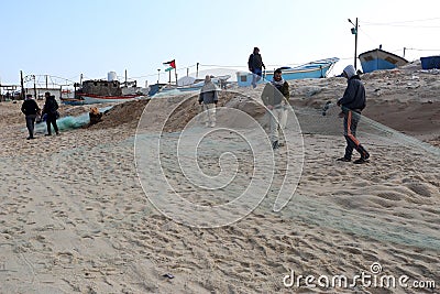 Palestinian fishermen on the Khan Younis Sea Editorial Stock Photo