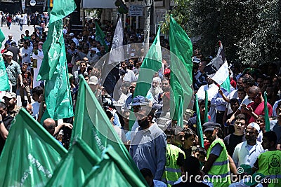 Palestinian Hamas supporters take part protest against Israel`s plan to annex parts of the occupied West Bank, in Khan Yunis in th Editorial Stock Photo