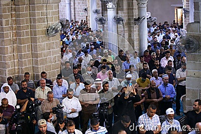 Relatives of Ramadan Shallah, the former leader of the Palestinian Islamic Jihad PIJ movement, mourn as they attend a memorial s Editorial Stock Photo