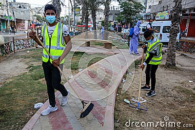 Palestinian municipality and civil defense employees organize a street cleaning and sterilization campaign in light of the coronav Editorial Stock Photo