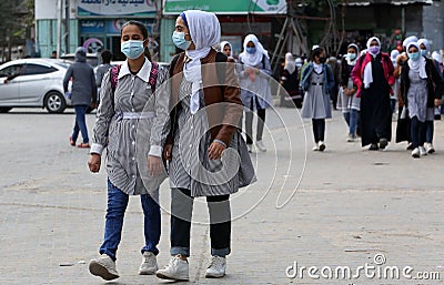 Palestinian students affiliated with the United Nations `UNRWA` a wear face masks amid the coronavirus pandemic Editorial Stock Photo