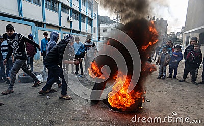 Palestinian students take part in a protest against the U.S. President Donald Trump`s Middle East peace plan Editorial Stock Photo