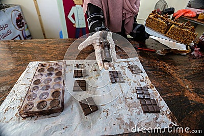 Palestinian women make sweets and traditional cakes in preparation for the blessed Eid Al-Adha feast Editorial Stock Photo