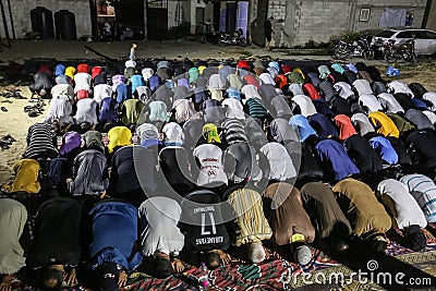 Palestinians pray `Laylat al-Qadr` prayer from Ramadan in the squares outside the mosques for the first time due to the closure of Editorial Stock Photo