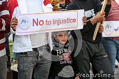 Palestinians protest against Britain`s possible designation of Hamas. A `terrorist group` Editorial Stock Photo