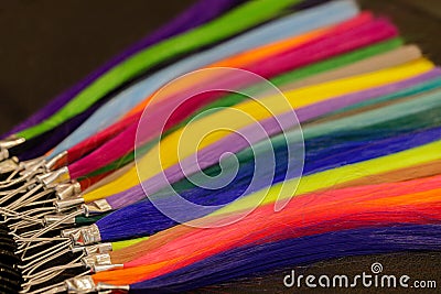 palette with bright samples of hair extensions Stock Photo