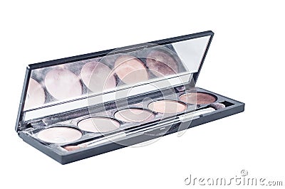 Palette with different shades of face shadows and brush applicator for application. Makeup set with a mirror on a white background Stock Photo