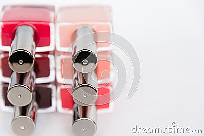 A palette of nail polish bottles on a white background Stock Photo