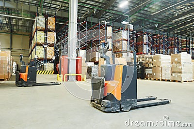 Pallet stacker truck at warehouse Stock Photo