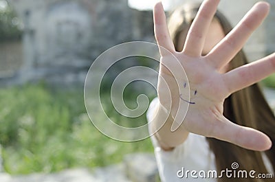 Palm with smile. Happy Woman or happiness concept. Blurred photo for background. Stock Photo