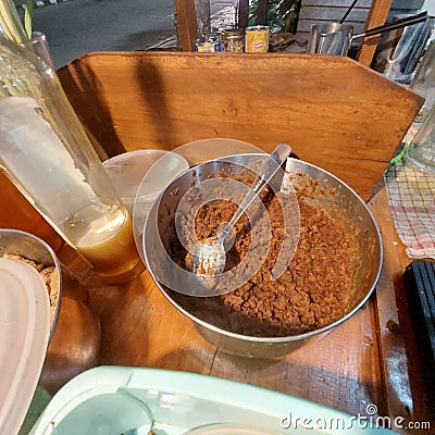palm sugar that has been mashed for sweetening Indonesian herbal drinks Stock Photo