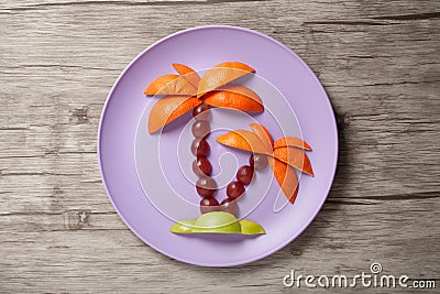 Palm tree made of fruits Stock Photo