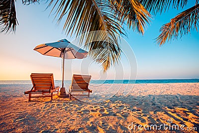 Dream scene. Beautiful beach sunset, palm tree over white sand beach. Summer nature view. Stock Photo
