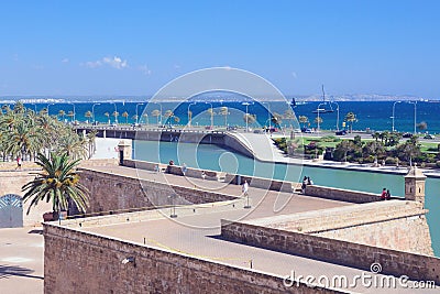 Cathedral of Santa Maria, as well as La Ceu. Beautiful view of the turquoise sea, yachts, sky and the promenade of Palma de Mallor Editorial Stock Photo