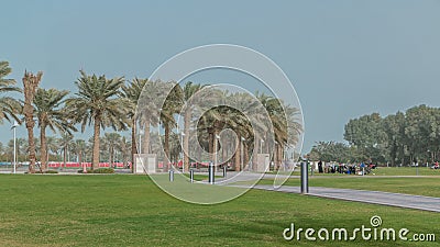 Palms in the MIA Park timelapse, located on one end of the seven kilometers long Corniche in the Qatari capital, Doha. Stock Photo