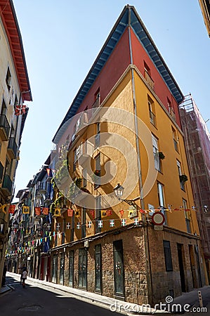07-09-2012 Pamplona, Spain - Majestic Facade with Striking Center Mural: Bilbao's Urban Artistic Marvel Editorial Stock Photo