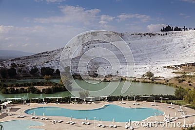 Pamukkale`s terraces are made of travertine, a sedimentary rock deposited by mineral water from the hot springs Stock Photo