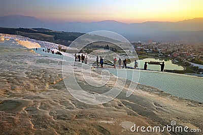 Landmark attraction - Sunset landscape with famous terraces of Pamukkale, Turkey Editorial Stock Photo