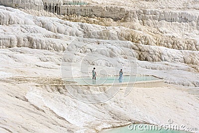 Pamukkale, Turkey, white limestone terraces and health giving thermal pools. Editorial Stock Photo