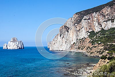 Pan di Zucchero rocks in the sea and Masua's sea stack (Nedida), Stock Photo