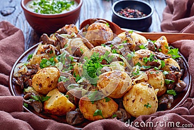 Pan fried new Potatoes with Wild porcini Stock Photo